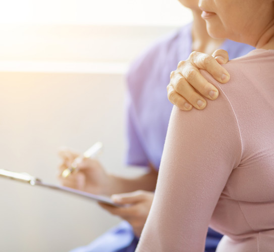 An-elderly-woman-examined-for-muscle-pain