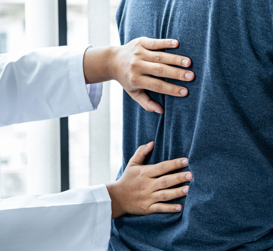 Doctor-is-checking-spine-of-the-patient