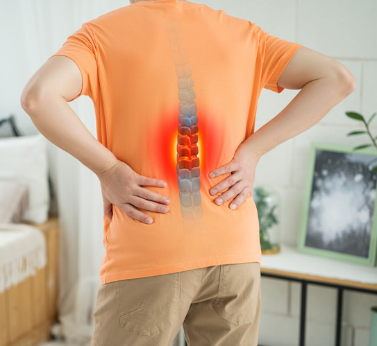 Man-holding-back-with-severe-back-pain-issue
