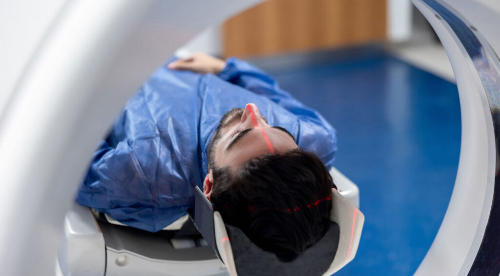 patient-lying-in-an-imaging-scanner patient-lying-in-an-imaging-scanner