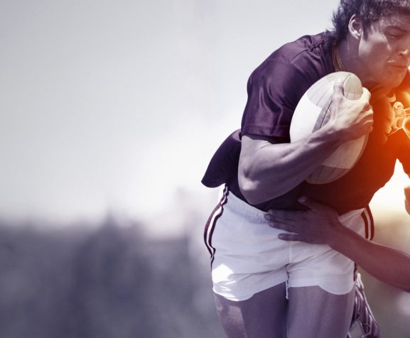 A-player-being-tackled-during-a-game-and-sustaining-an-injury