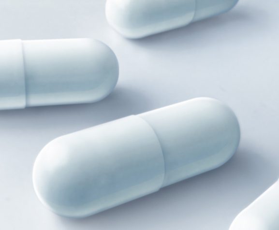 Capsules-in-a-container-representing-medication